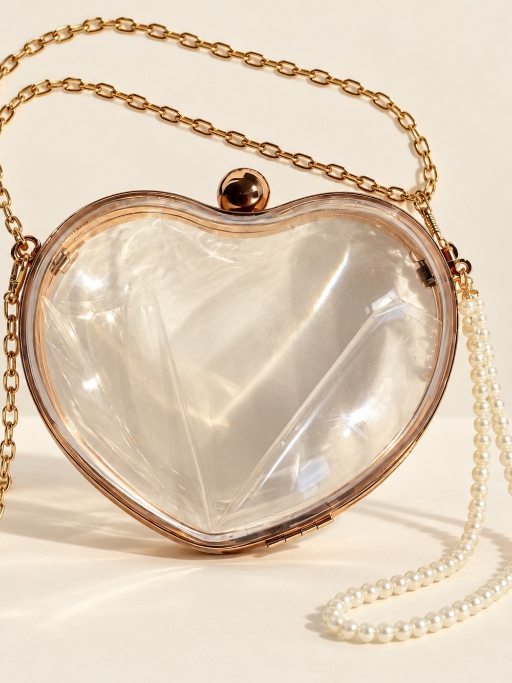 Clear Heart-Shaped Clutch with Gold Chain